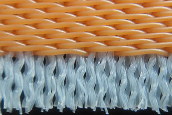 A piece of desulfurization mesh fabric whose weft thread is composed of thin filaments.
